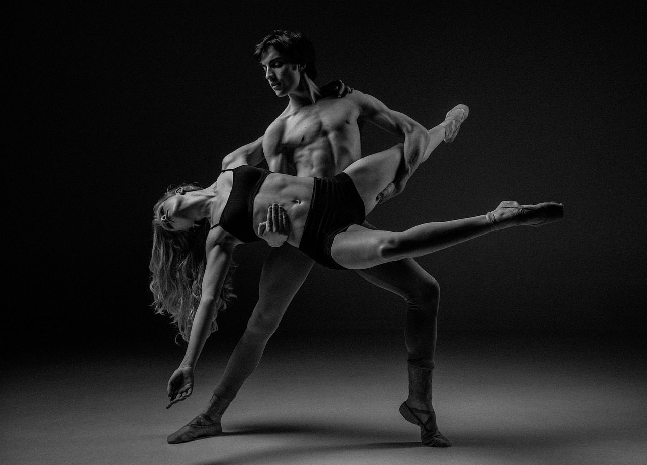 Ballerinas practicing in a studio, demonstrating classical ballet.